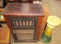 A 20th century mahogany side cabinet with a glazed door together with a tap dancing practice mat