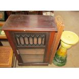 A 20th century mahogany side cabinet with a glazed door together with a tap dancing practice mat