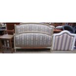 A pad upholstered double head and footboard together with a single headboard and a high stool