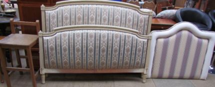 A pad upholstered double head and footboard together with a single headboard and a high stool