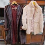 A National Fur Company coat together with another coat