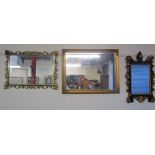 A gilt wall mirror together with a collection of modern wall mirrors