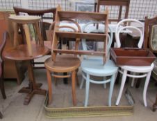 Three bentwood dining chairs together with a rug, hanging shelves, stool,