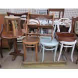 Three bentwood dining chairs together with a rug, hanging shelves, stool,