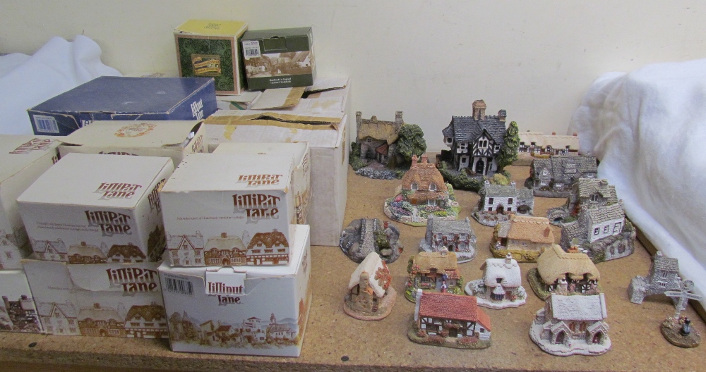 A collection of Lilliput lane cottages together with two other cottages