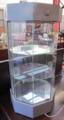 A tabletop display cabinet of octagonal shape