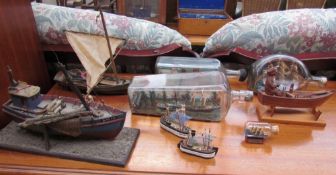 A collection of ships in bottles together with model ships etc