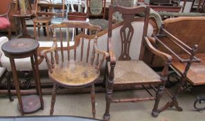 A spindle back kitchen chair together with another elbow chair, a jardiniere stand,