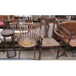 A spindle back kitchen chair together with another elbow chair, a jardiniere stand,