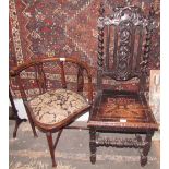 An oak dining chair together with a mahogany corner chair