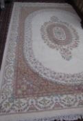 A large Indian cream ground rug