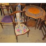 A carved occasional table together with a pair of bedroom chairs and a salon chair