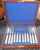 A cased set of fish knives and forks
