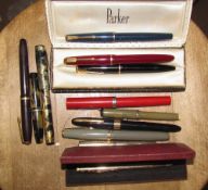 A collection of Parker and other fountain pens