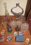 Glass paperweights together with glass vases,