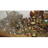Assorted brasswares including candlesticks, vases, etc together with glass vases,