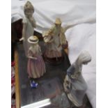 A Lladro figure of a lady holding lilies together with a recollections of wales figurine,