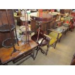 A Victorian walnut games table together with two folding cake stands,