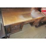 A 20th century oak desk,