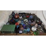 A collection of Caithness and other glass paperweights together with vases etc