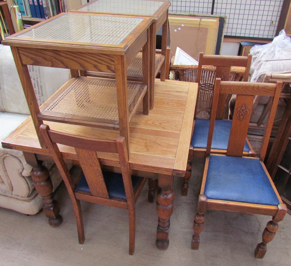 A 20th century oak extending dining table together with four chairs and a pair of bergère bedside