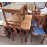 A 20th century oak extending dining table together with four chairs and a pair of bergère bedside