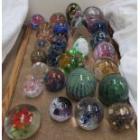 A collection of paperweights including Mdina, Caithness, Kerry Glass,