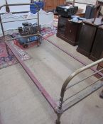 A brass and iron single bed