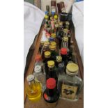 A collection of miniatures including Macleod's, Cointreau, Tia Maria, Cherry Brandy,