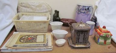 Assorted pottery jelly moulds together with an electroplated and glass biscuit barrel, pottery jug,