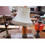 A Victorian upholstered chair together with three table lamps and a candelabra