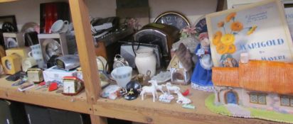 Assorted clocks, pottery cottage, barometer, radios,