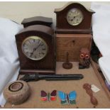 An oak mantle clock together with other mantle clocks, toy gun, tobacco box, love spoon,