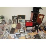 A black lacquer microscope together with a rosewood box, cigarette cards,