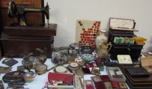 A set of three oak trays together without pin set, daguerreotypes, Singer sewing machine,