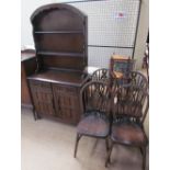 A 20th century Dutch oak dresser together with a set of four wheel back dining chairs