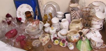 A silver topped dressing table pot together with drinking glasses,