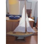 A model yacht on a stand