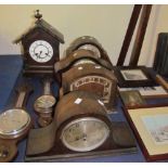 A collection of 20th century mantle clocks, barometers,