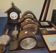 A collection of 20th century mantle clocks, barometers,