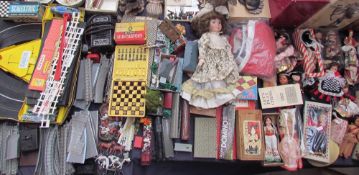 A part Scalextric set together with other toys, dolls, souvenir dolls etc