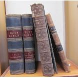 Two volumes of the Holy Bible together with Harmsworth Atlas and Gazetteer and Old England leather