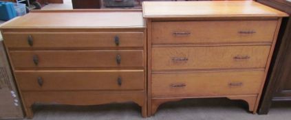 A mid 20th century oak chest of drawers together with another oak chest of drawers