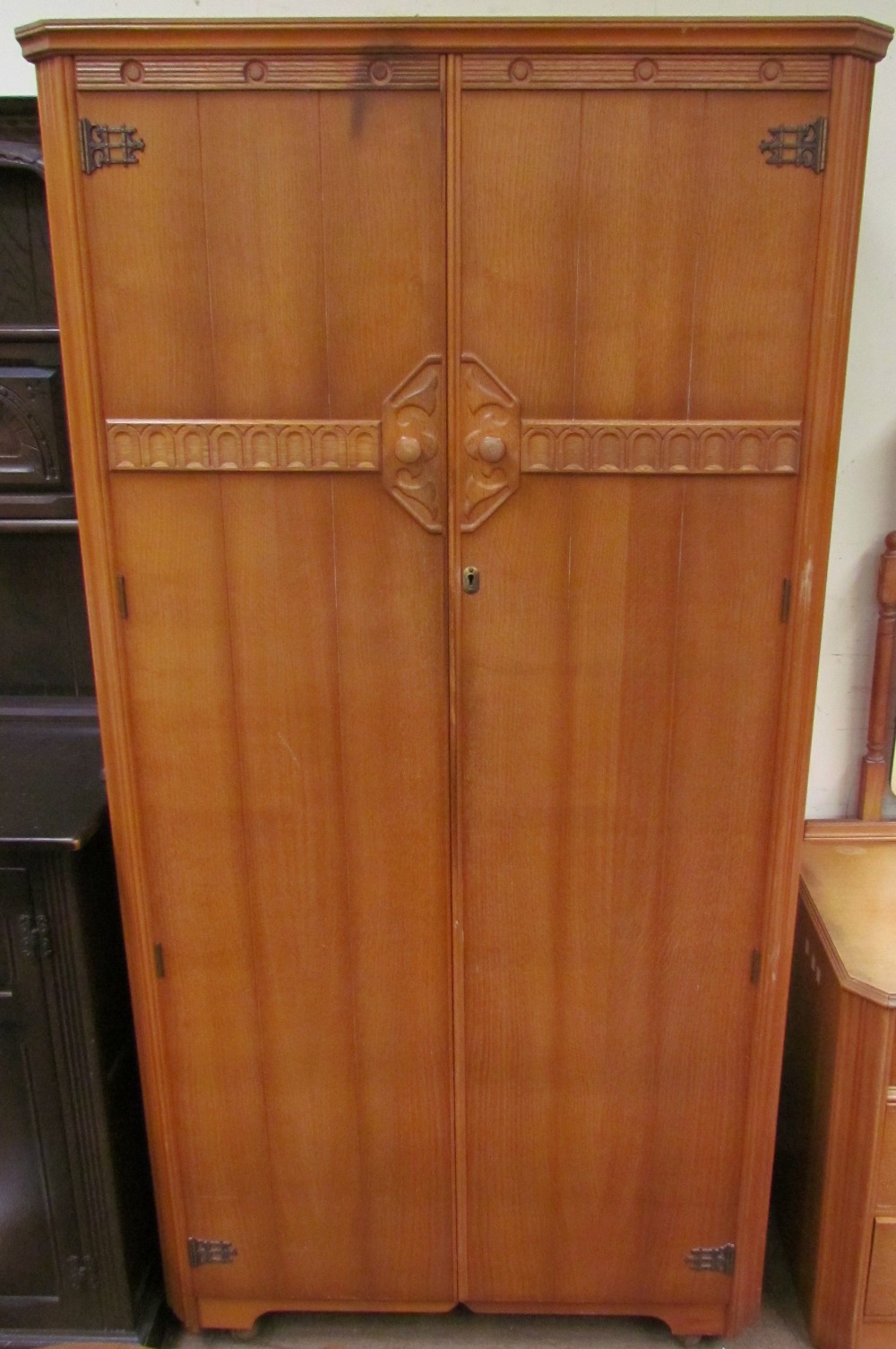 A 20th century oak bedroom suite comprising two wardrobes, dressing table and bedside cabinet - Image 2 of 4