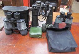 A pair of Visionary 7 x 50 binoculars together with three other pairs of binoculars