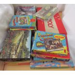 A collection of Jigsaw puzzles, together with board games and Railway magazines