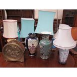 Six assorted table lamps together with two pottery vases and a glass bottle with stopper
