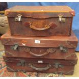 Three leather suitcases of graduating sizes