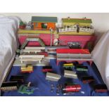 A Hornby Series tin plate locomotive and tender together with assorted carriages, railway stations