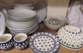 A Polish part dinner set together with Boleslawiec pottery